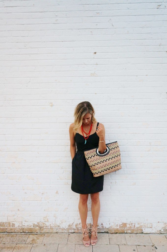Little black dress, wrap up heels, tote, and statement jewelry
