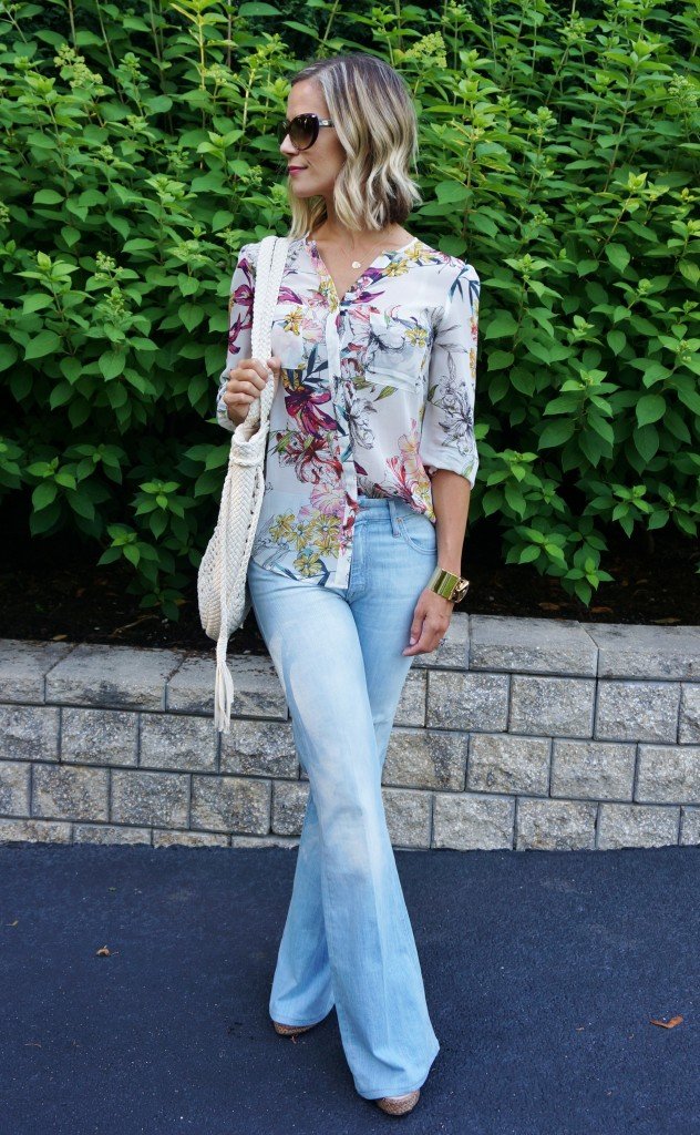 Floral top, flare jeans, crochet bag, wedges, sunglasses, gold jewelry