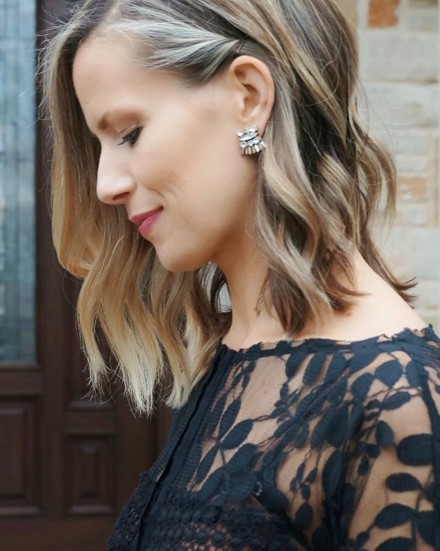 Date night outfit: black dress, heels, and pink clutch