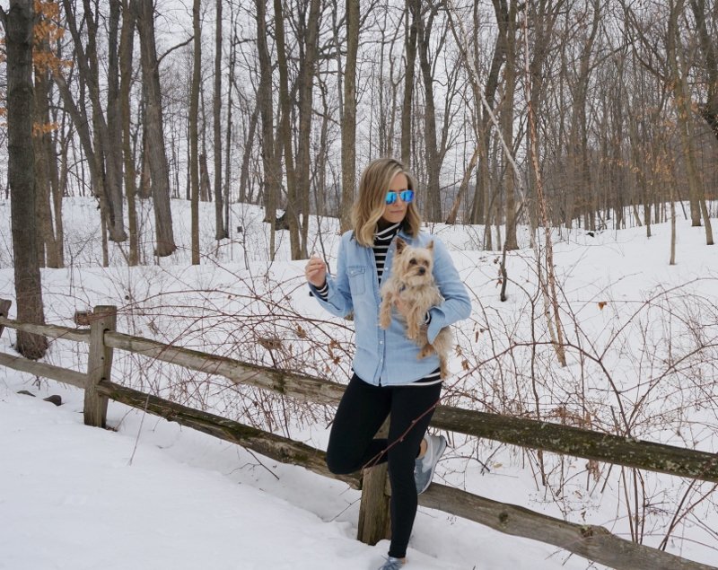 Leggings, striped turtleneck, chambray shirt, sneakers, and pup