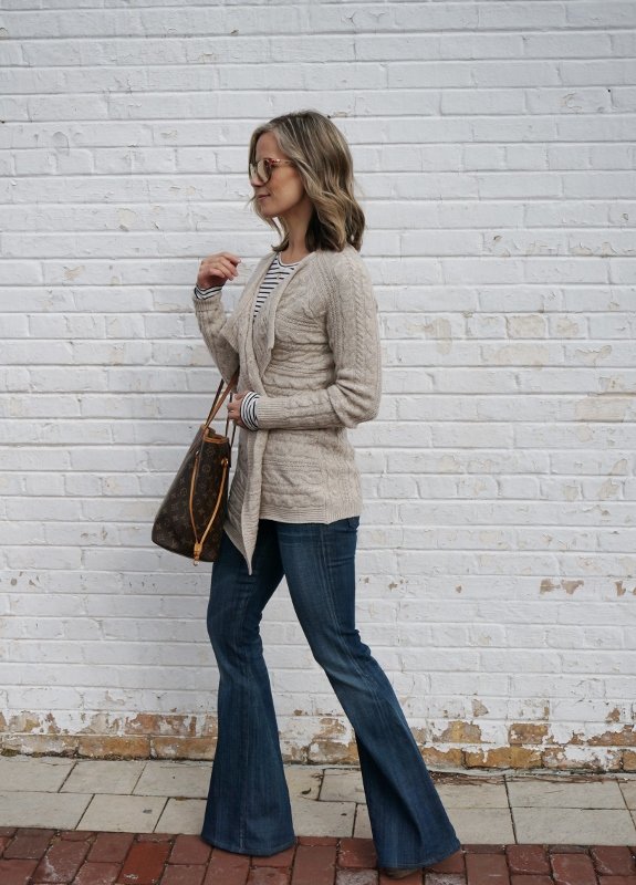 Cozy layers: striped tee, cardigan, flare pants, sunglasses, Louis Vuitton bag