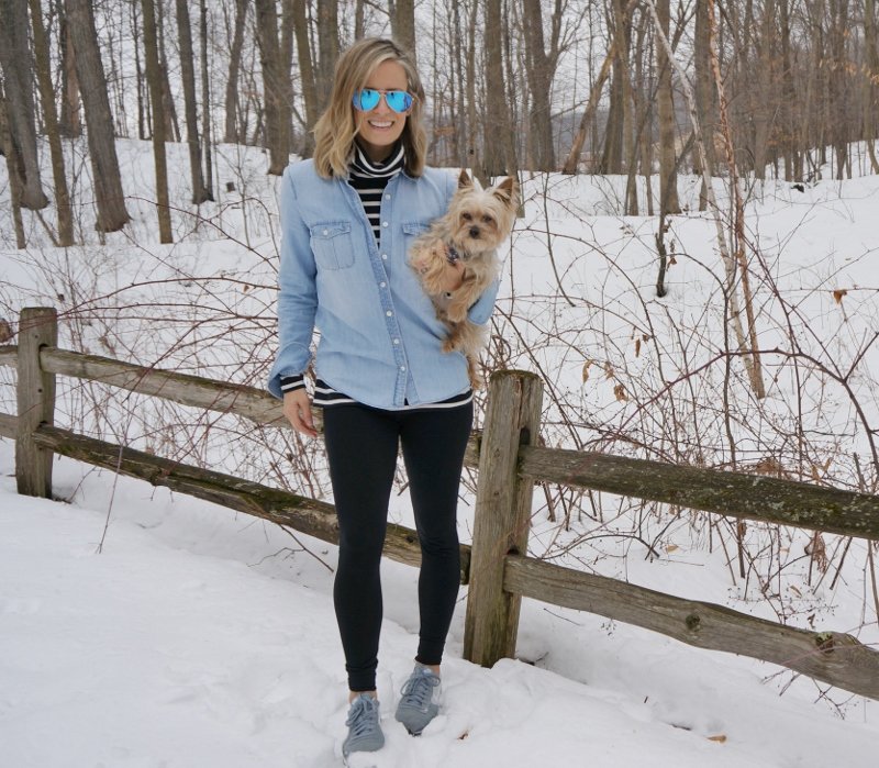 Leggings, striped turtleneck, chambray shirt, sneakers, and pup