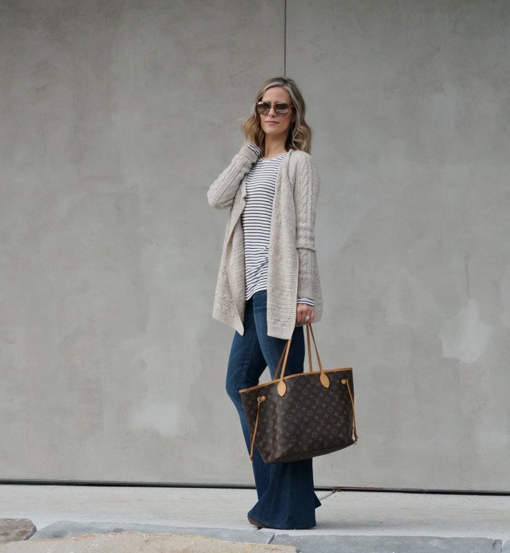 Cozy layers: striped tee, cardigan, flare pants, sunglasses, Louis Vuitton bag