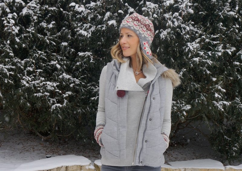 Winter style: Grey sweater, vest, denim, Uggs, gloves, and beanie