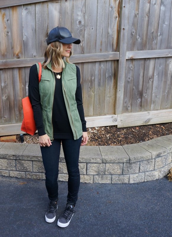 Comfortable Look: black tee, denim, vest, tote, baseball cap