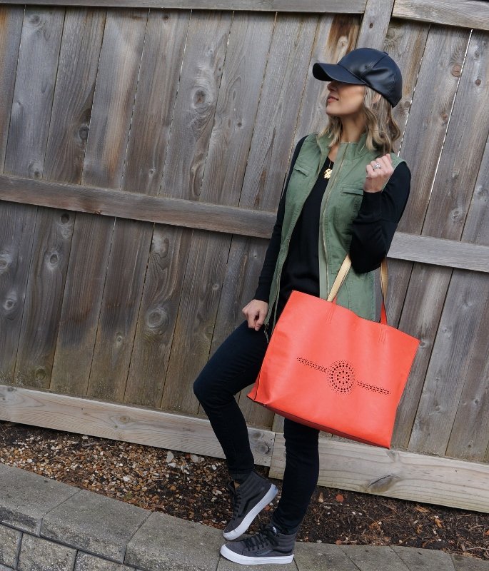 Comfortable Look: black tee, denim, vest, tote, baseball cap