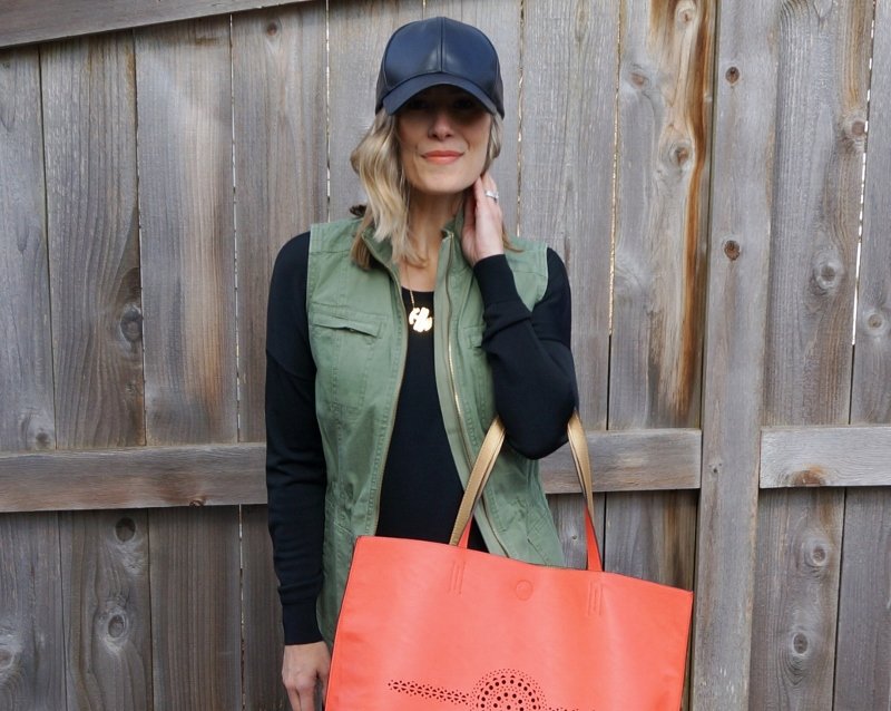 Comfortable Look: black tee, denim, vest, tote, baseball cap