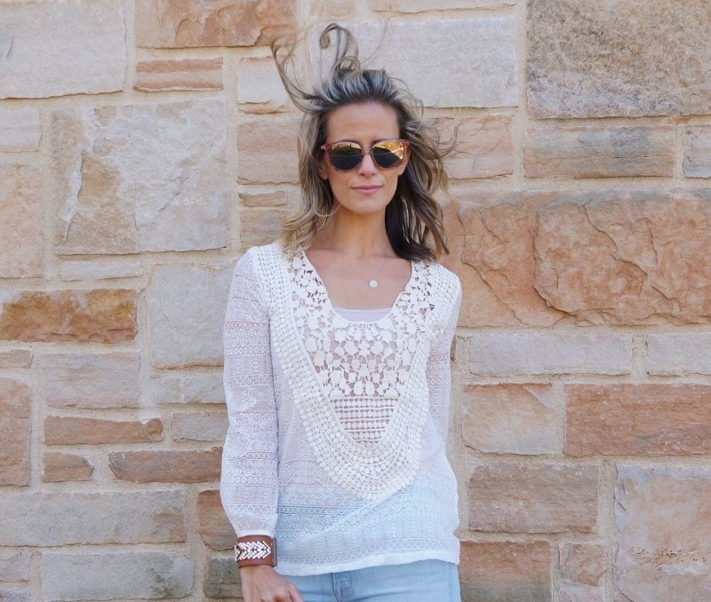 Lace top, flare jeans, Chloe bag, wedges, and sunglasses