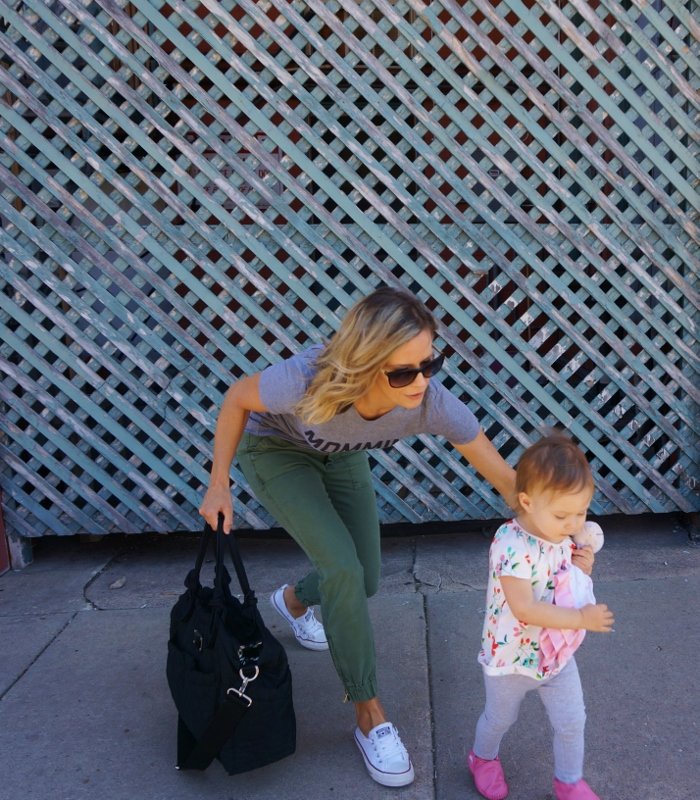 #momlife: graphic tee, olive pants, tote, sunglasses, and sneakers
