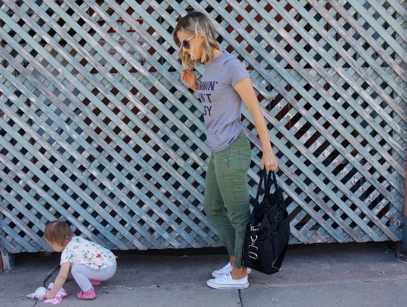 #momlife: graphic tee, olive pants, tote, sunglasses, and sneakers