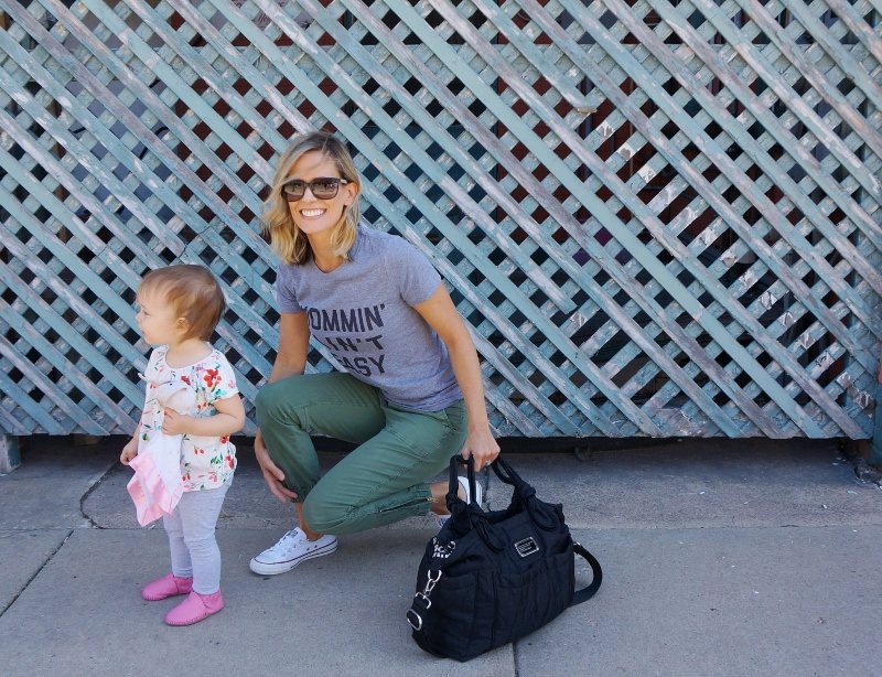 #momlife: graphic tee, olive pants, tote, sunglasses, and sneakers