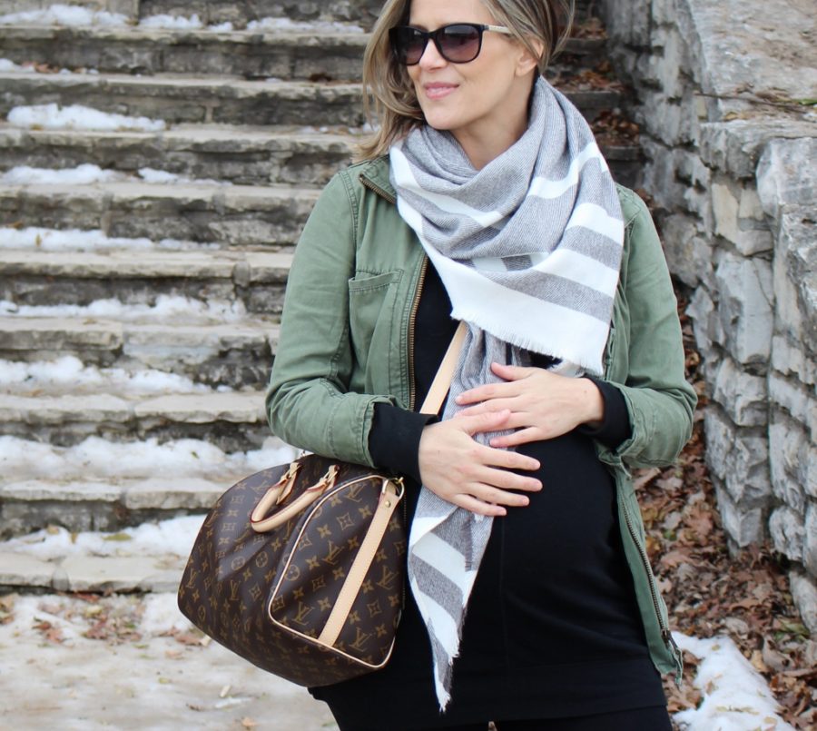 Army jacket, black tee, leggings, scarf, crossbody, rain boots