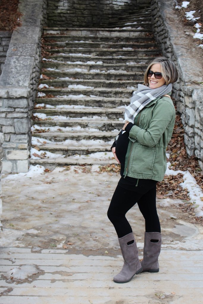 Army jacket, black tee, leggings, scarf, crossbody, rain boots