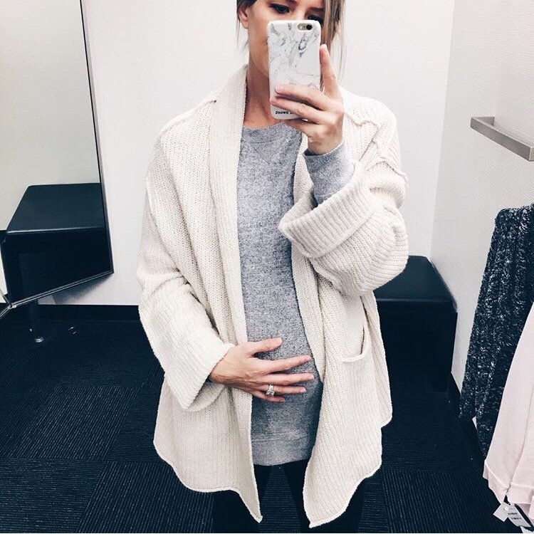 Bump style: sweatshirt, cardigan, and leggings