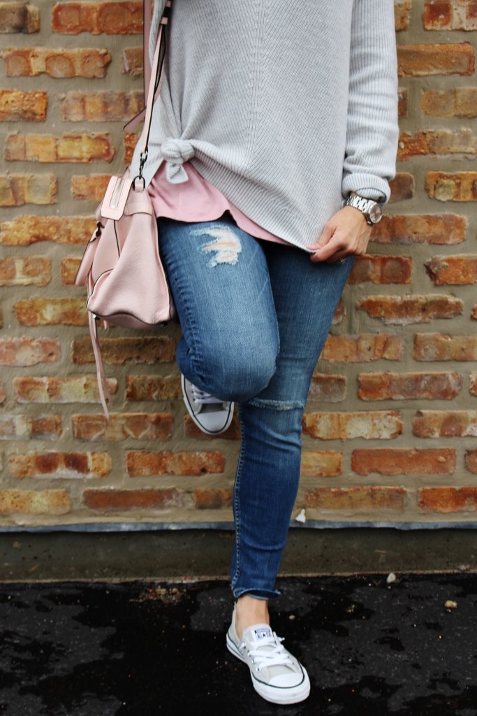 Spring sweater, denim, handbag, and sneakers