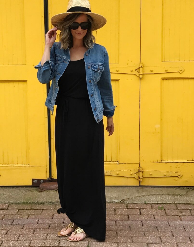 Black maxi dress, denim jacket, straw hat
