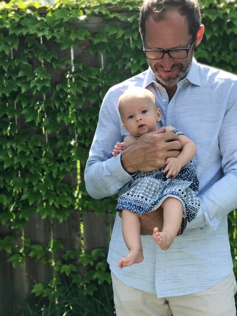 Family pics, white maxi dress for mom and matching blue print dress for the girls