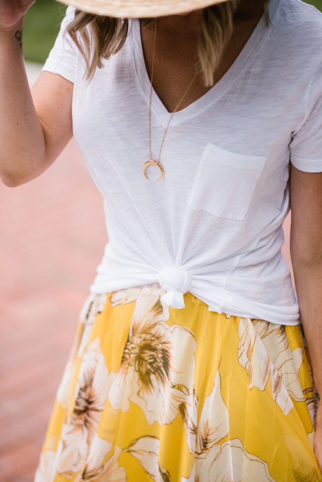 Summer style: floral maxi skirt, white tee, straw hat, sunglasses, sandals