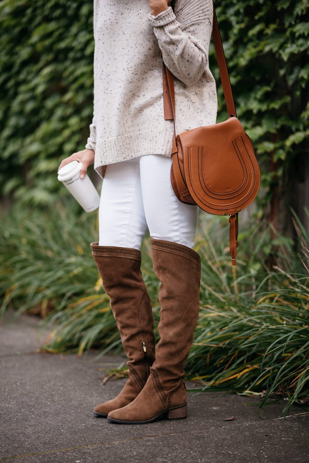 Sweater, white denim, over the knee boots, cross body bag