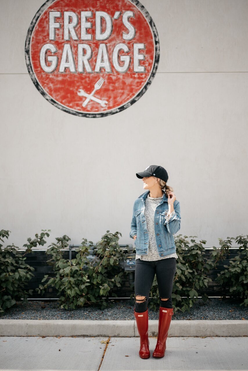 Sweater, black denim, jean jacket, baseball hat, Hunter boots