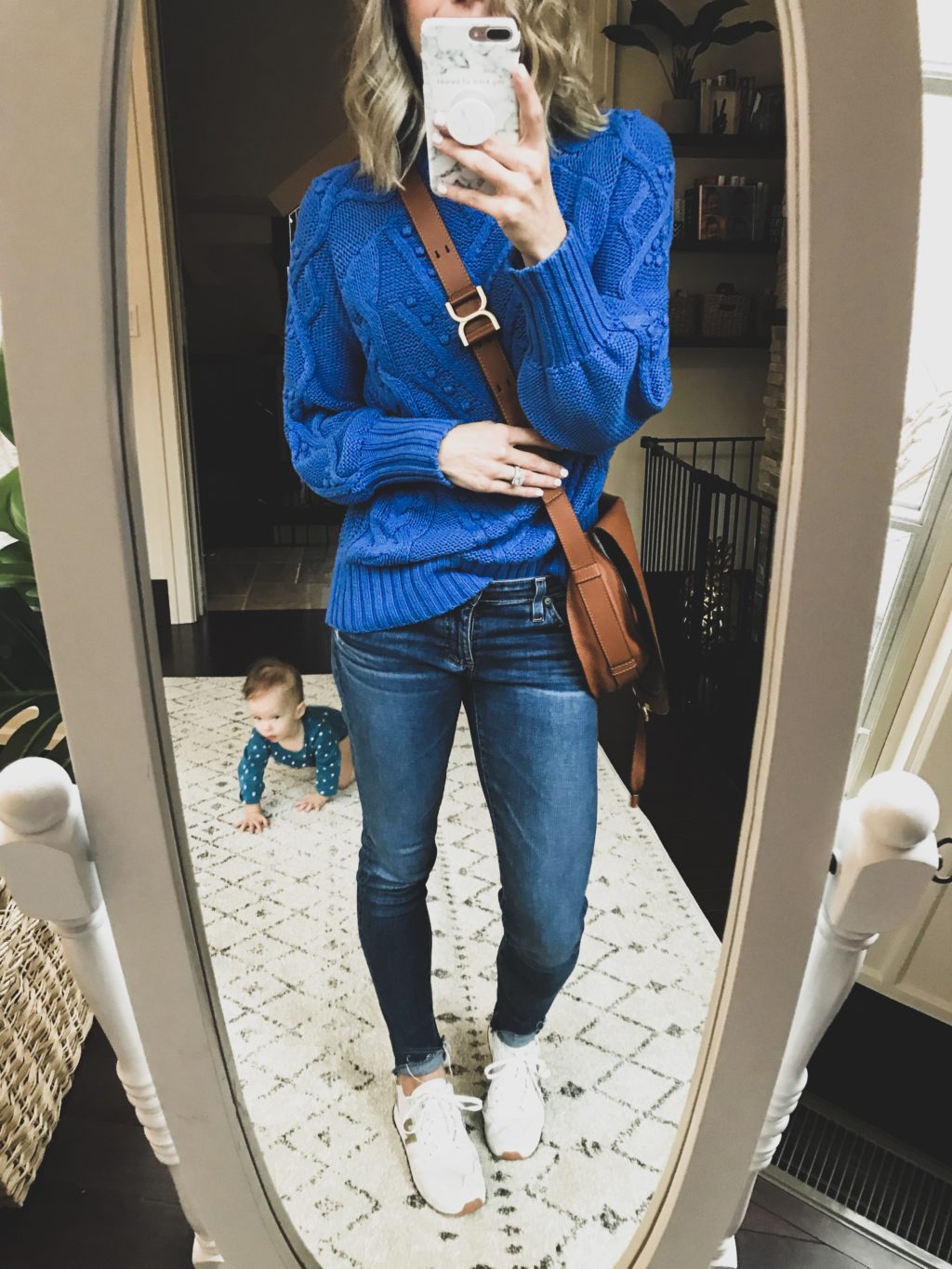 #ootd blue sweater, denim, sneakers, and crossbody