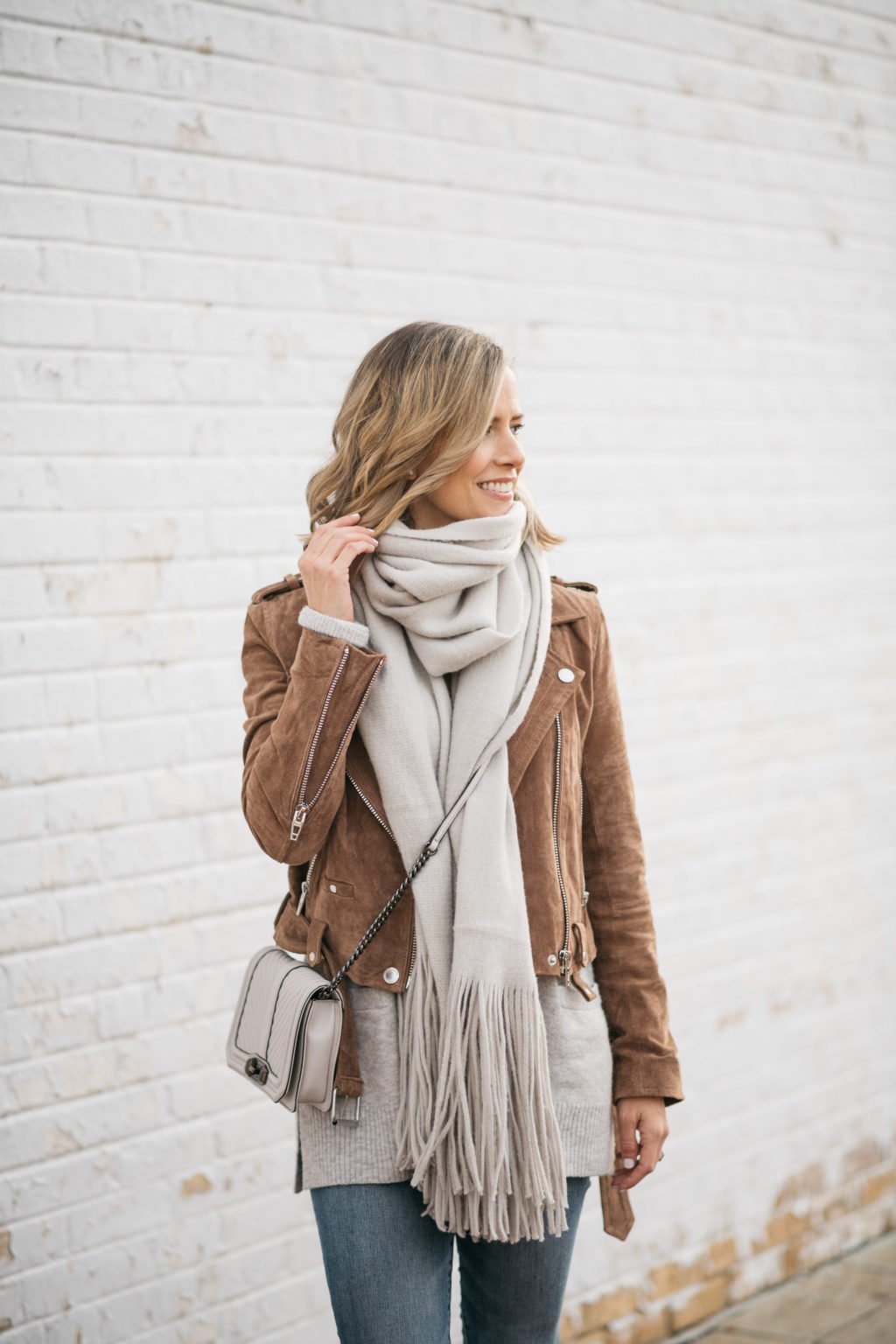 Brown suede moto jacket, sweater, scarf, denim, cross body,