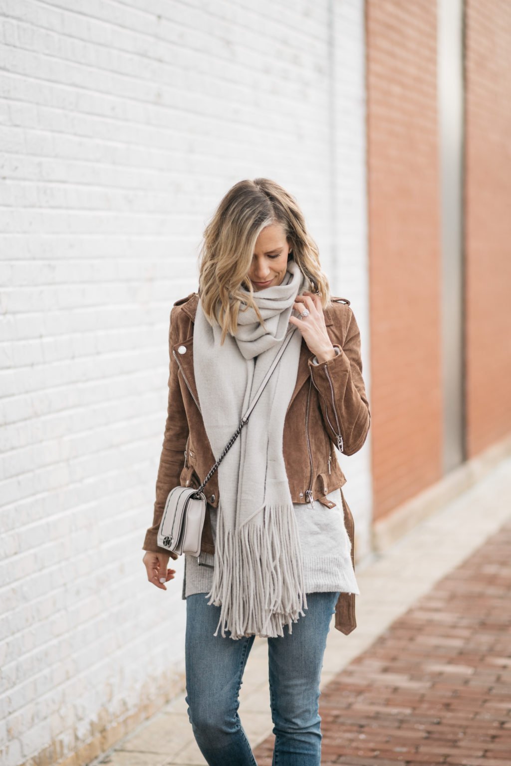 Brown suede moto jacket, sweater, scarf, denim, cross body, booties