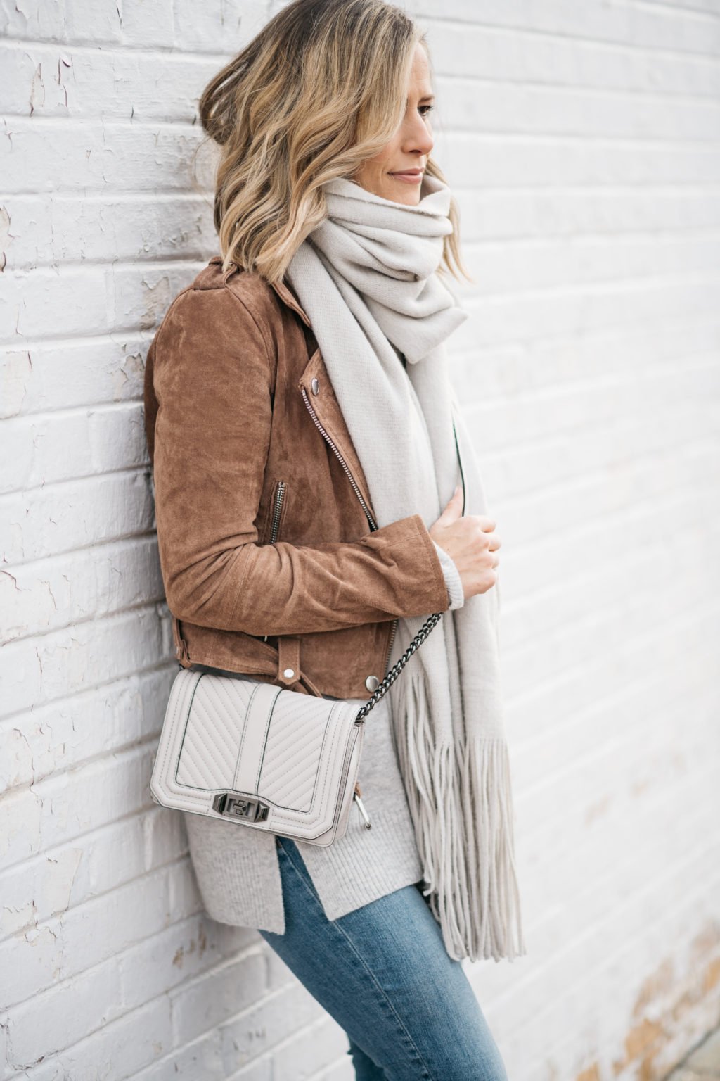 Brown suede moto jacket, sweater, scarf, denim, cross body, booties