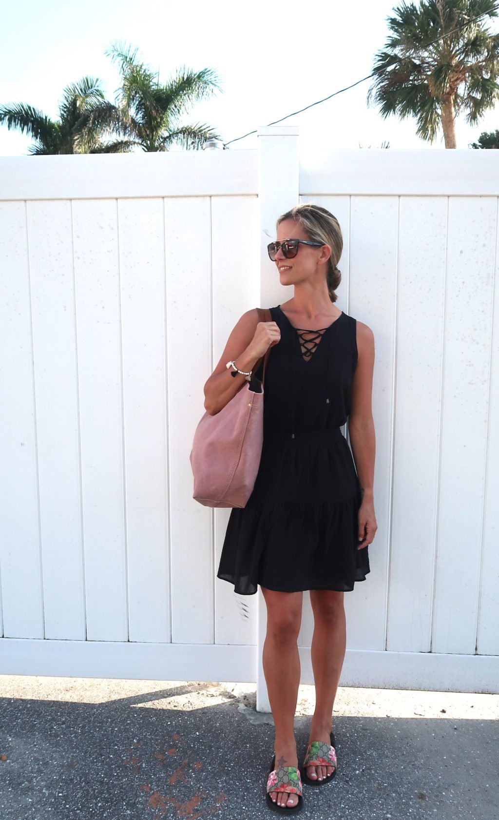 Beach vacation style, black dress, oink tote, sandals
