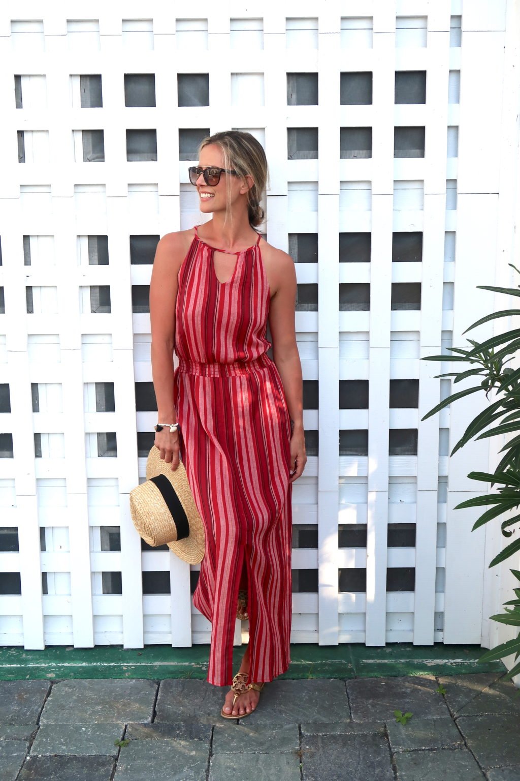 Beach vacation style, striped maxi dress, straw hat, sandals