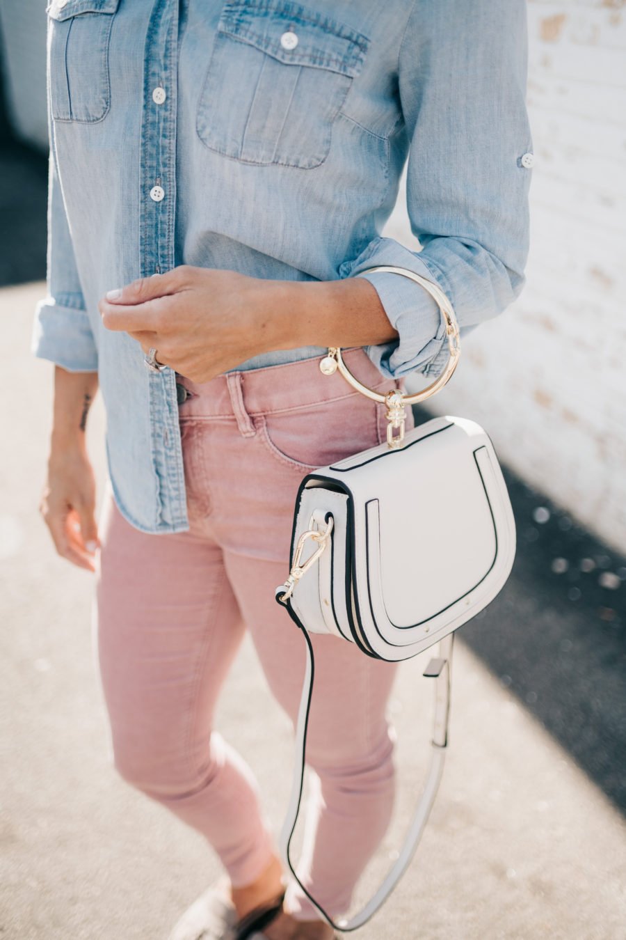 Denim shirt, pink jeans, Chloe dupe bag, sunglasses, and mules