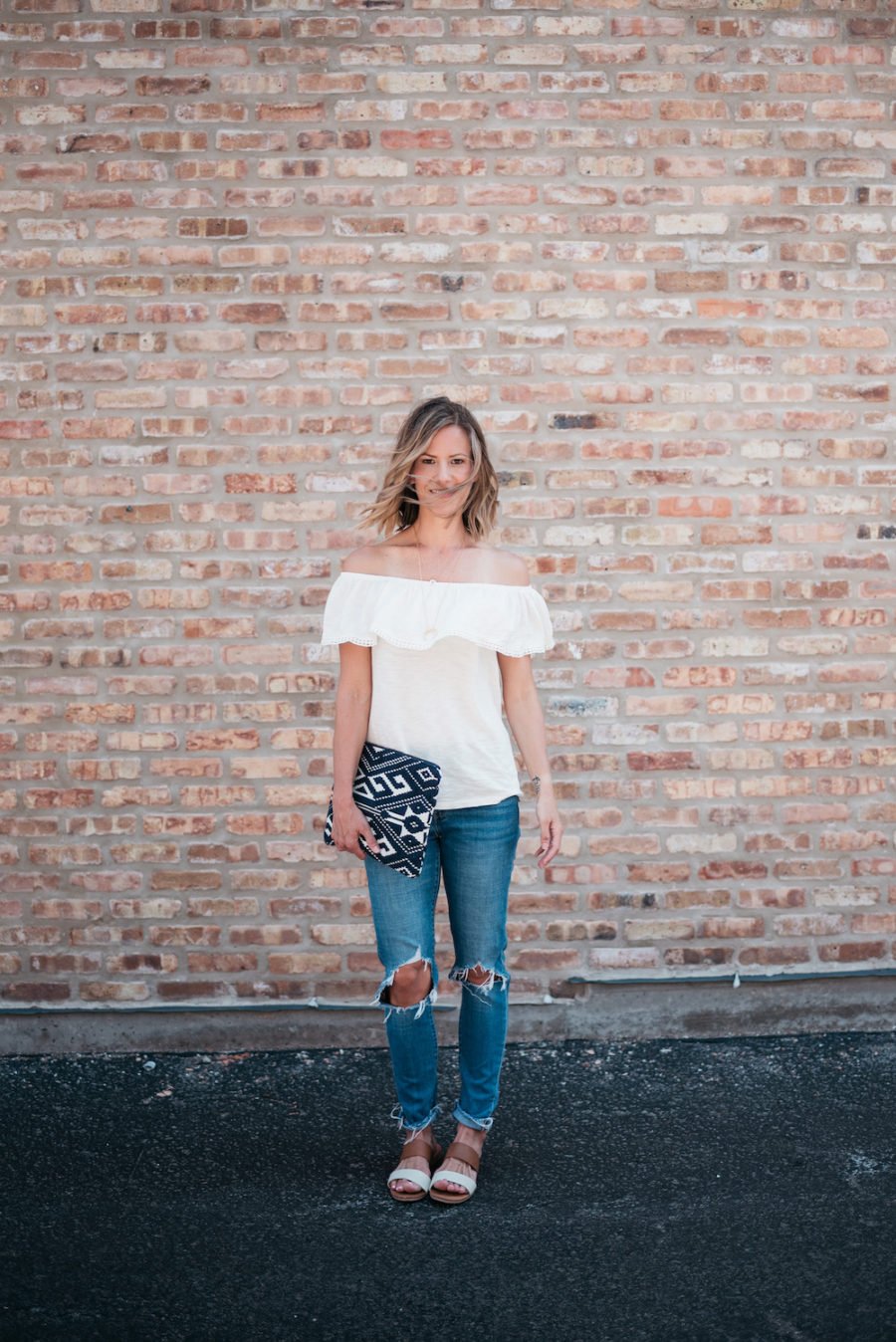 Off the shoulder top, denim, sandals, clutch
