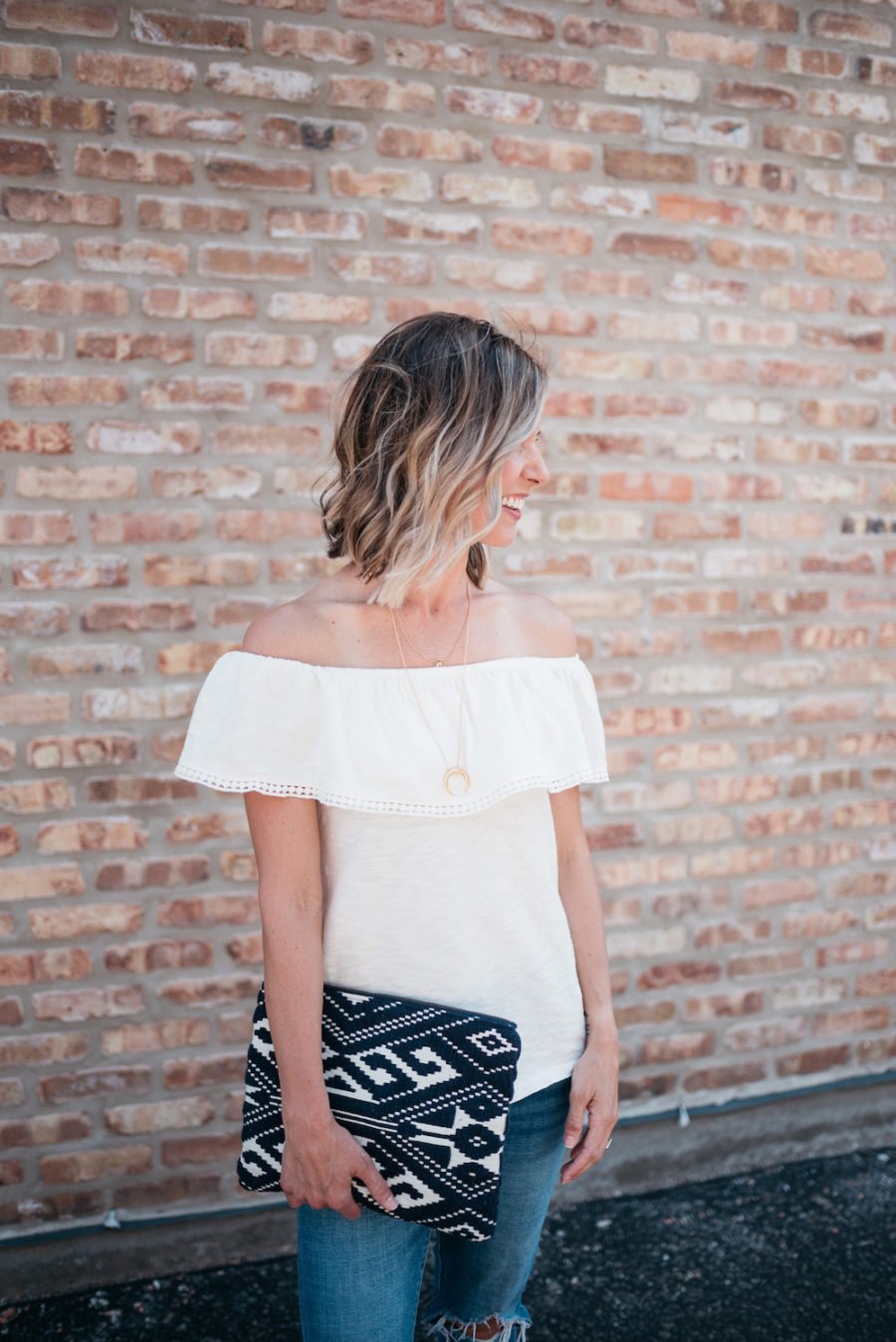Off the shoulder top, denim, sandals, clutch