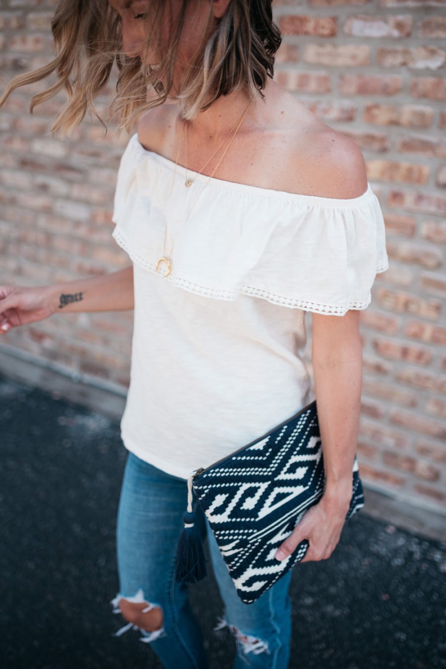 Off the shoulder top, denim, sandals, clutch
