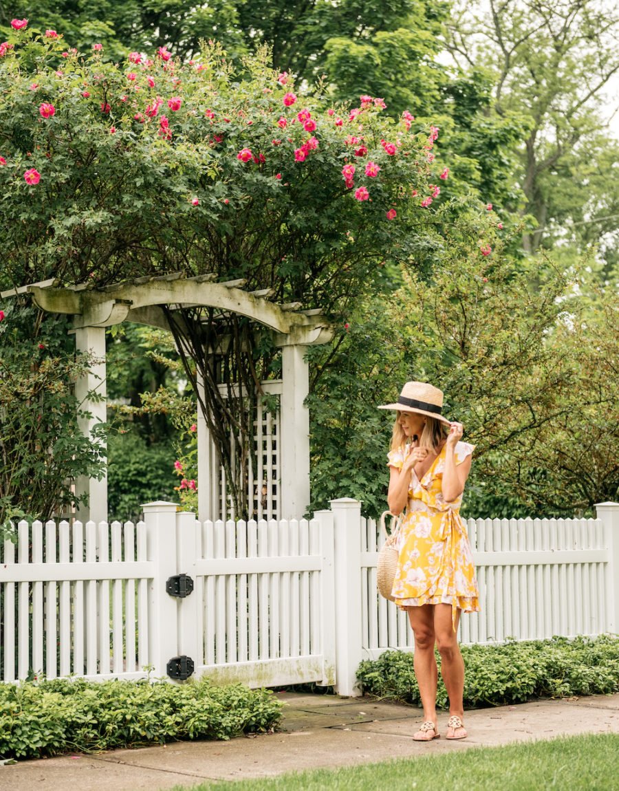 Floral dress, straw bag, straw hat, sandals