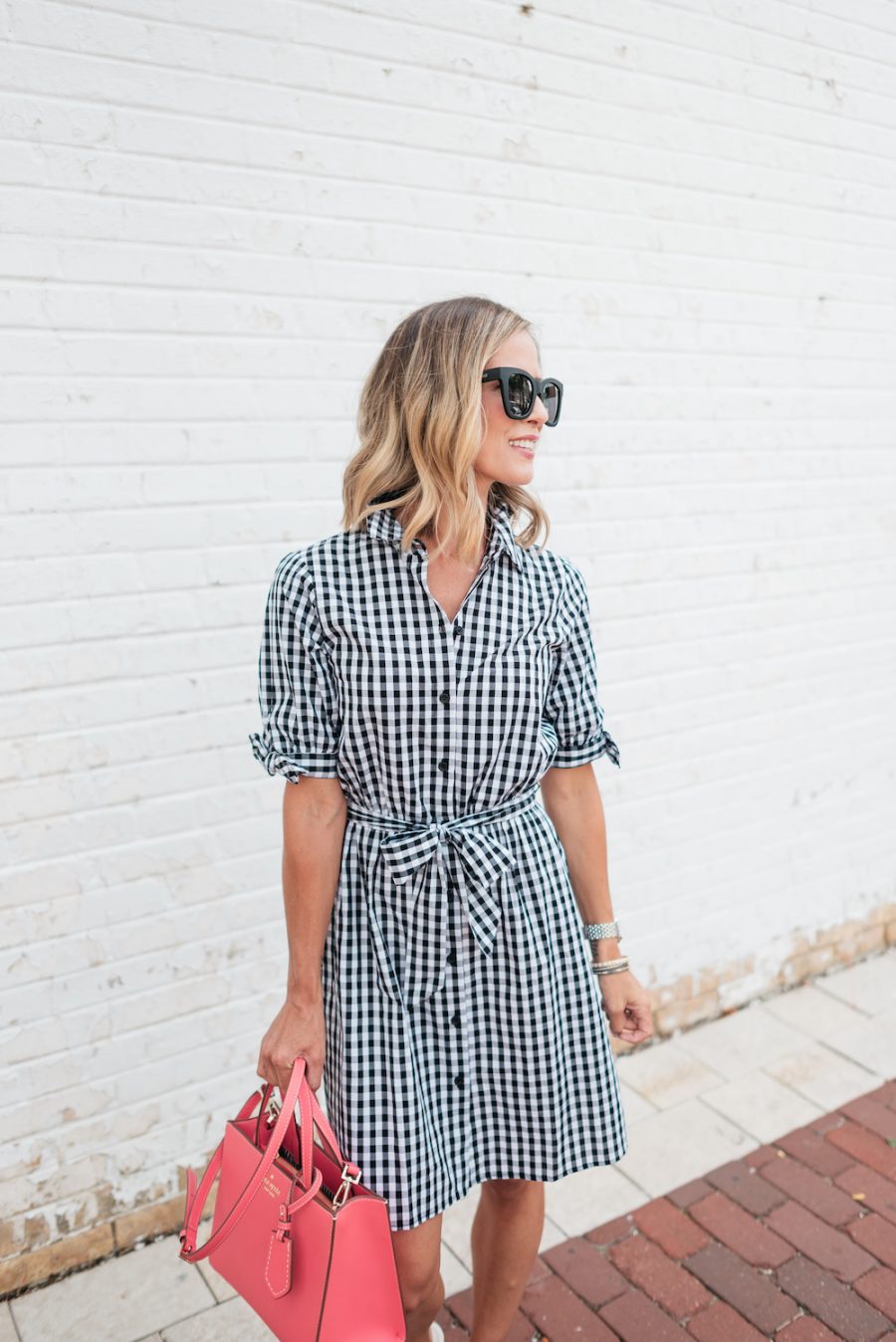 Gingham dress, sandals, sunglasses, and Kate Spade handbag