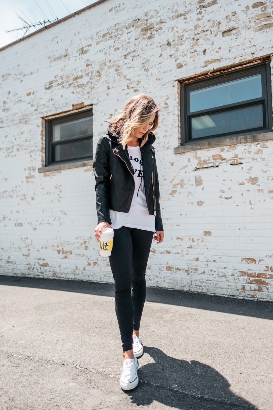 Graphic tee, leggings, moto jacket, Converse