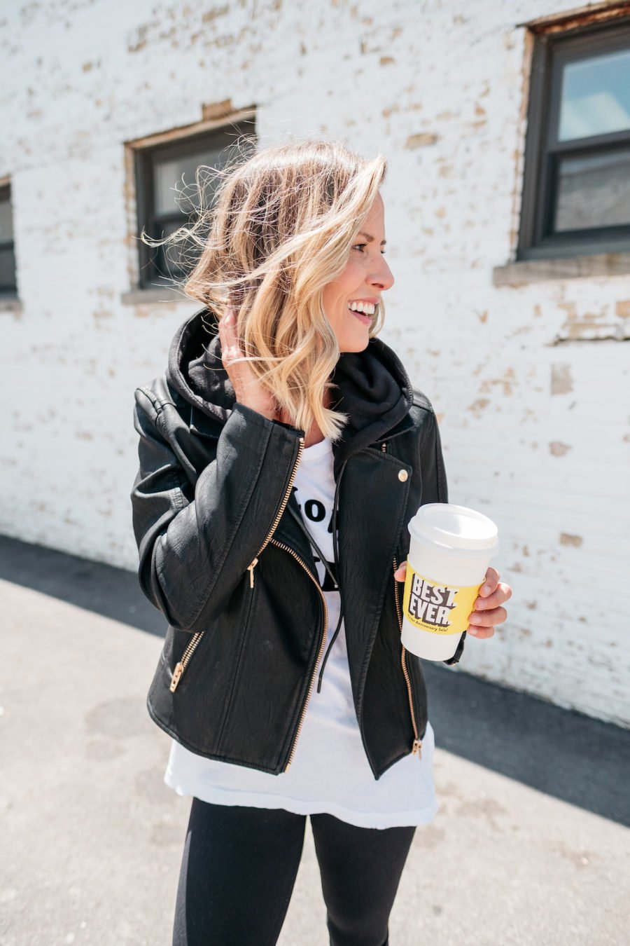 Graphic tee, leggings, moto jacket, Converse