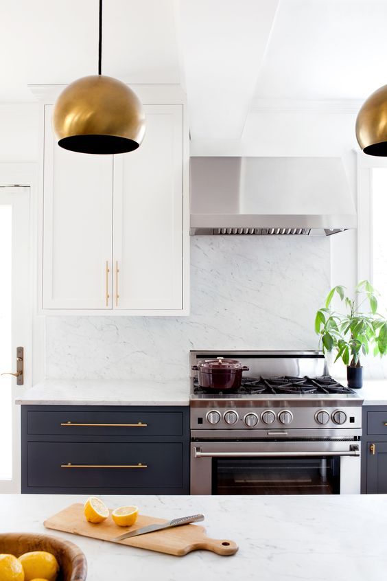 Kitchen remodel inspiration, white and black cabinets with gold accents