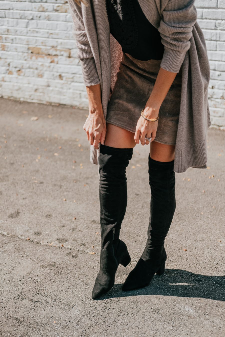 Cardigan, black top, brown suede skirt, leopard bag, over the knee boots