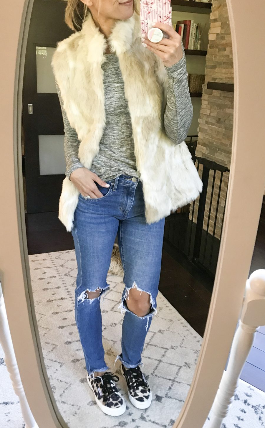 Faux fur vest, long sleeve tee, Levi's jeans, Superga leopard sneakers
