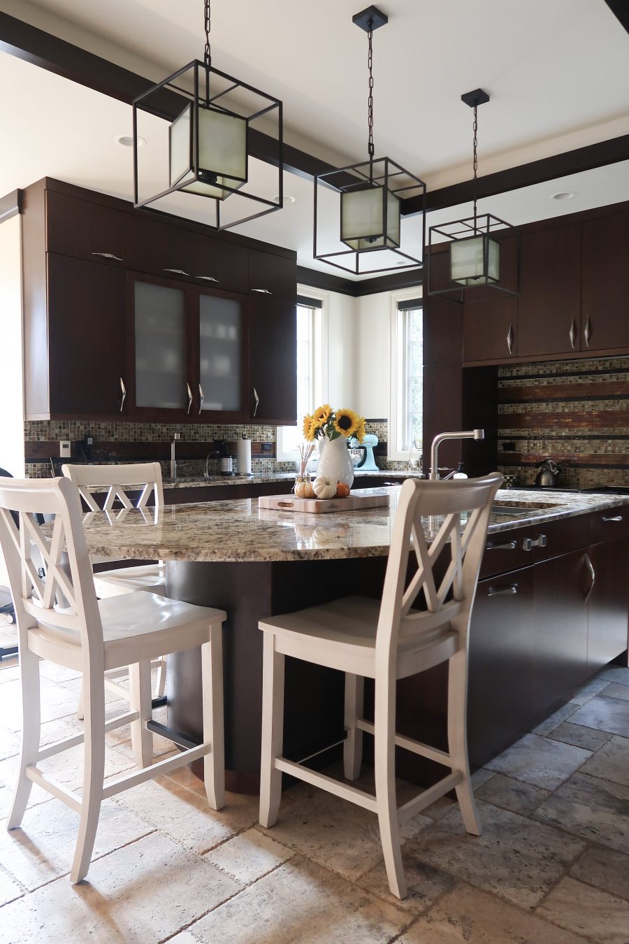 Our current kitchen, dark wood cabinets and granite countertops