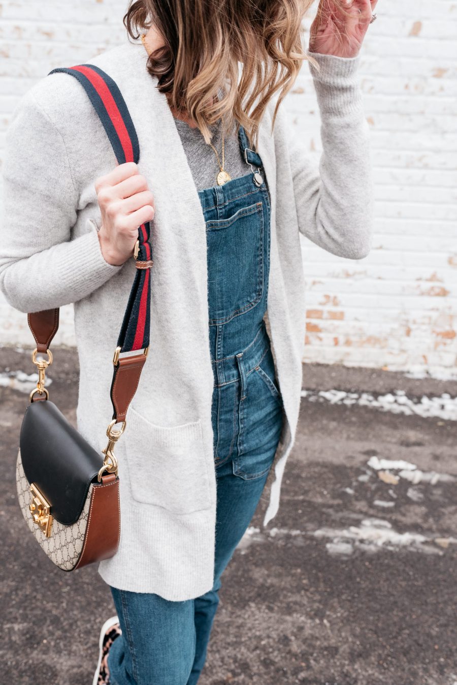 Overalls, cardigan, cross body bag, sneakers, and Palm coin necklace