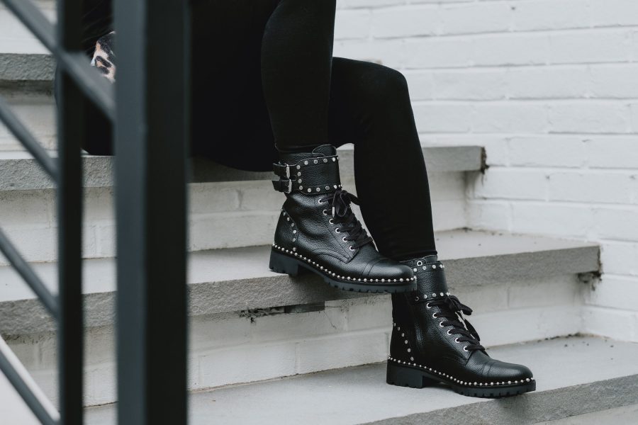 Edgy outfit ideas--all black with leopard scarf and combat boots