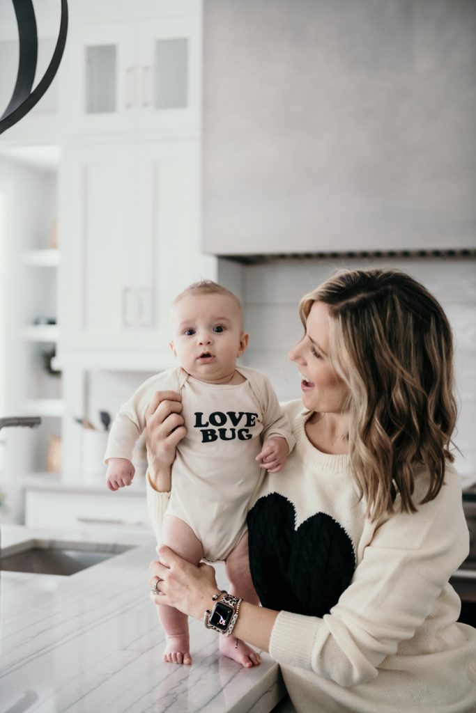I'm rounding up another Friday Five of my favorites including a baby onesie, no show socks, a pajama set, lash primer, and cherry blossoms.