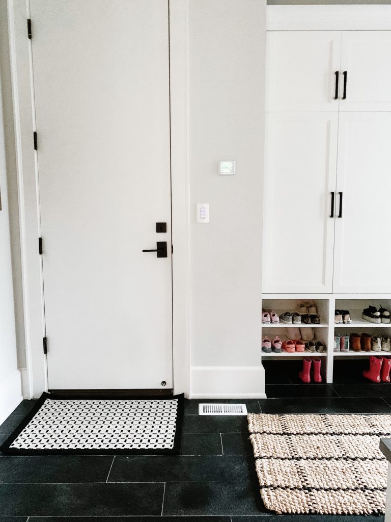 I'm sharing a glimpse into our mudroom and my favorite baskets, hooks, and bins to keep the space organized and give easy access to the kids.