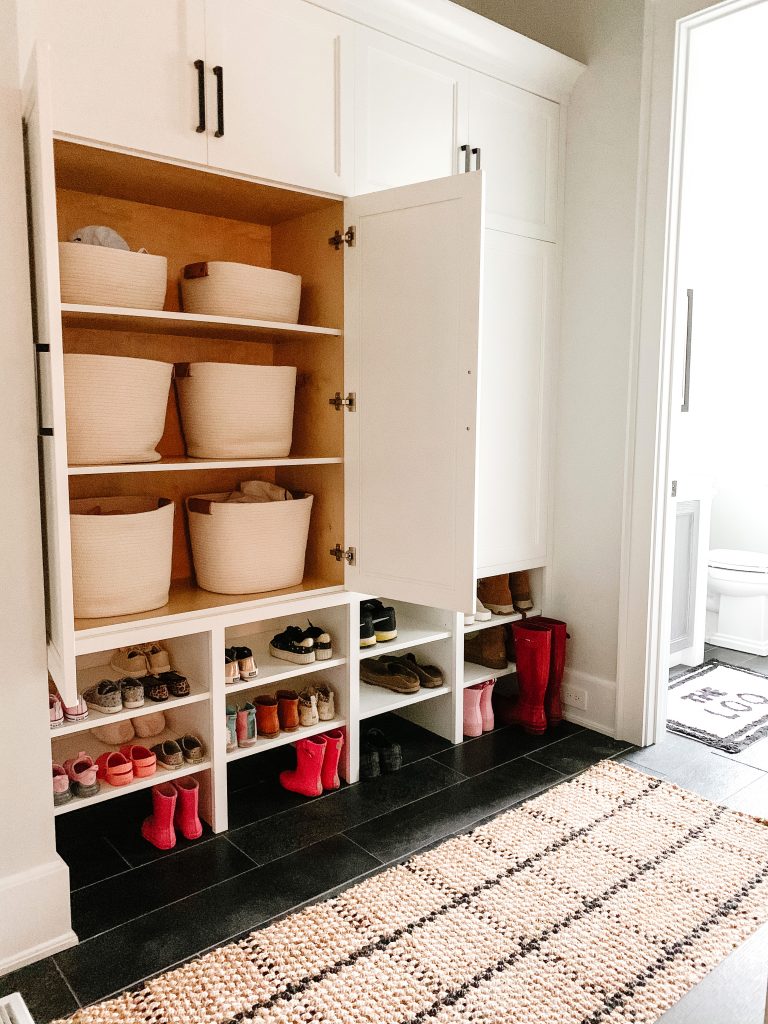 I'm sharing a glimpse into our mudroom and my favorite baskets, hooks, and bins to keep the space organized and give easy access to the kids.