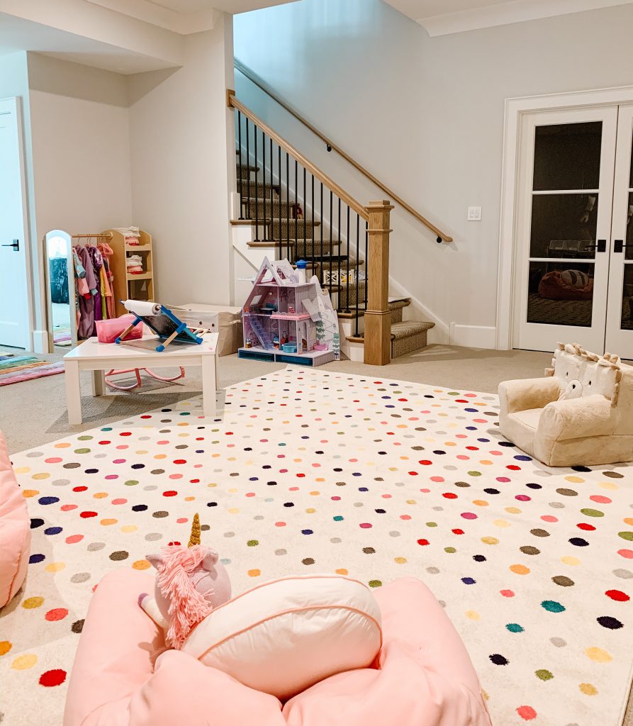 I'm finally sharing an update on the playroom organization process including my favorite shelves and baskets, toys, and decor.