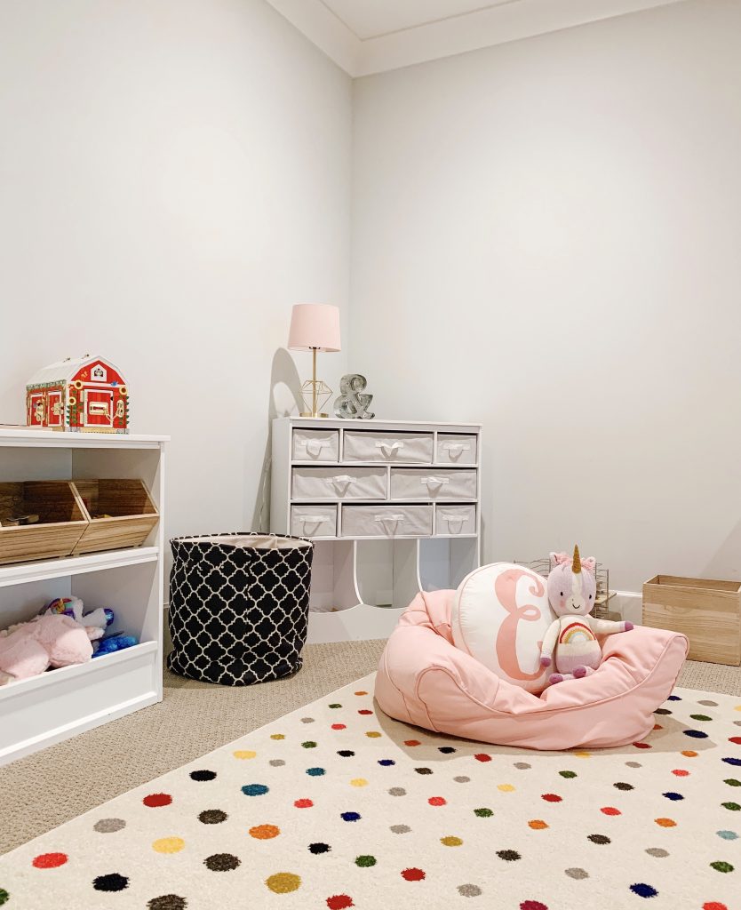 I'm finally sharing an update on the playroom organization process including my favorite shelves and baskets, toys, and decor.