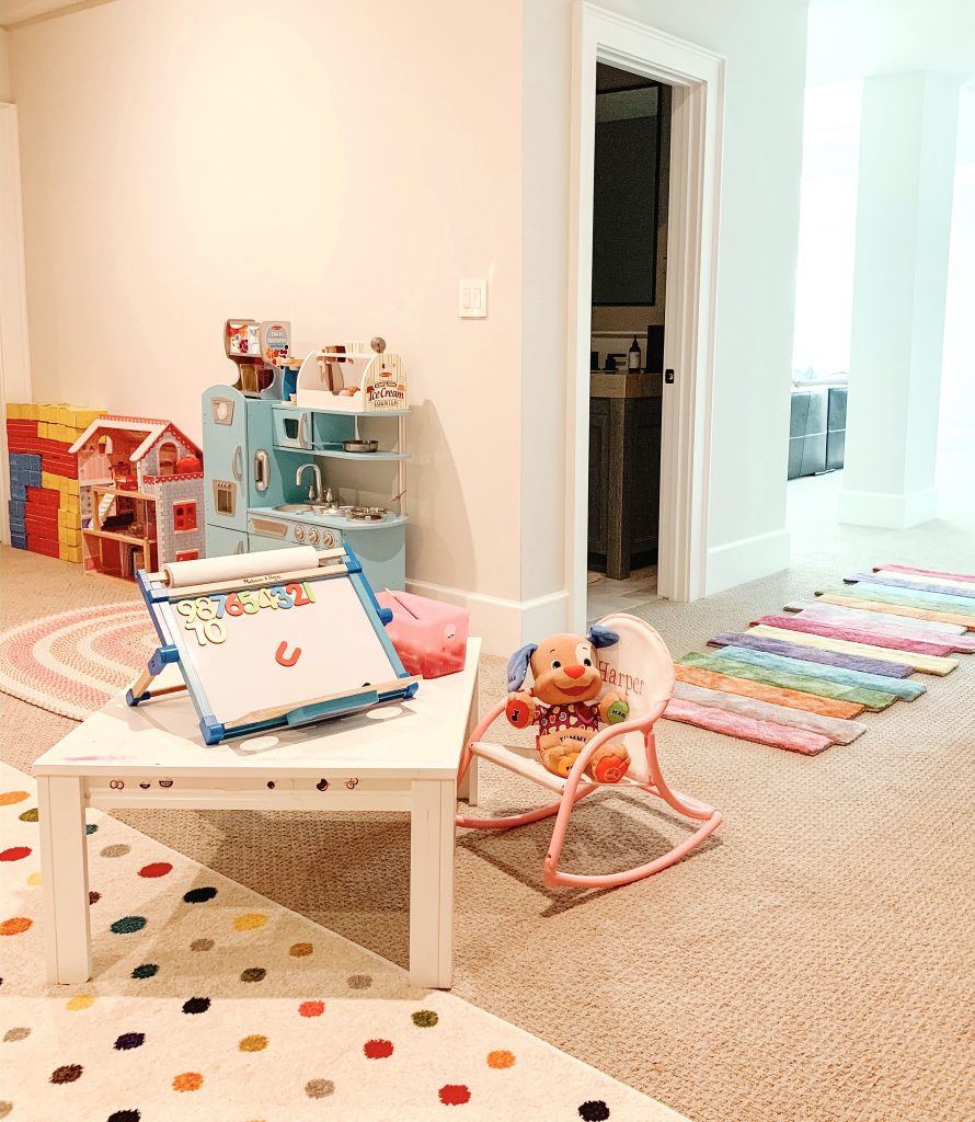 I'm finally sharing an update on the playroom organization process including my favorite shelves and baskets, toys, and decor.